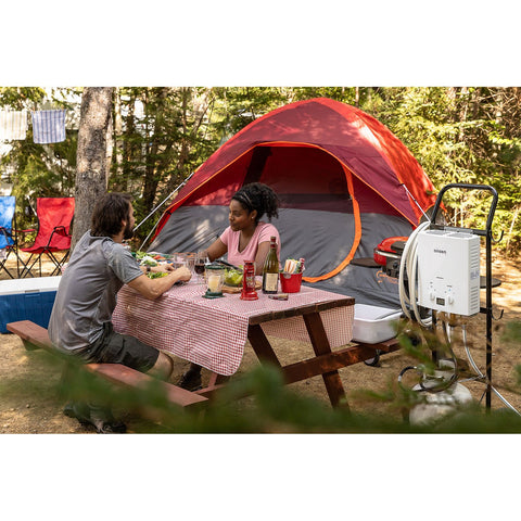 Couple having Picnic and using Onsen 5L Portable Propane Water Heater